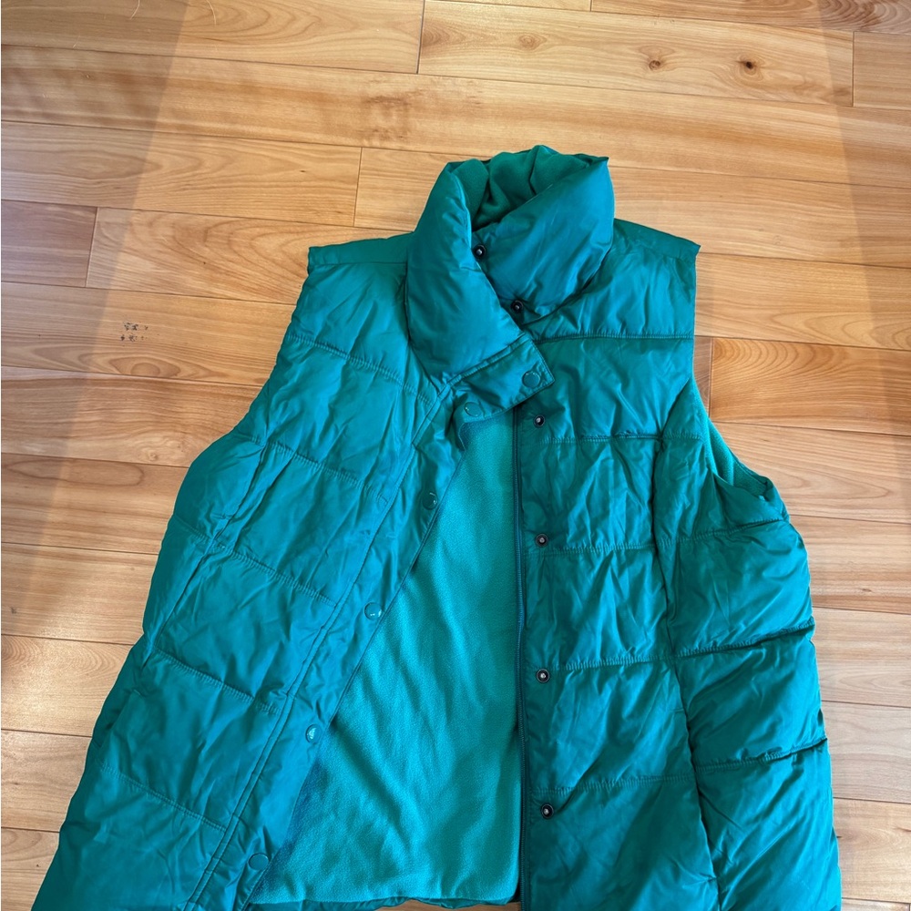 Old Navy green puffer vest.
